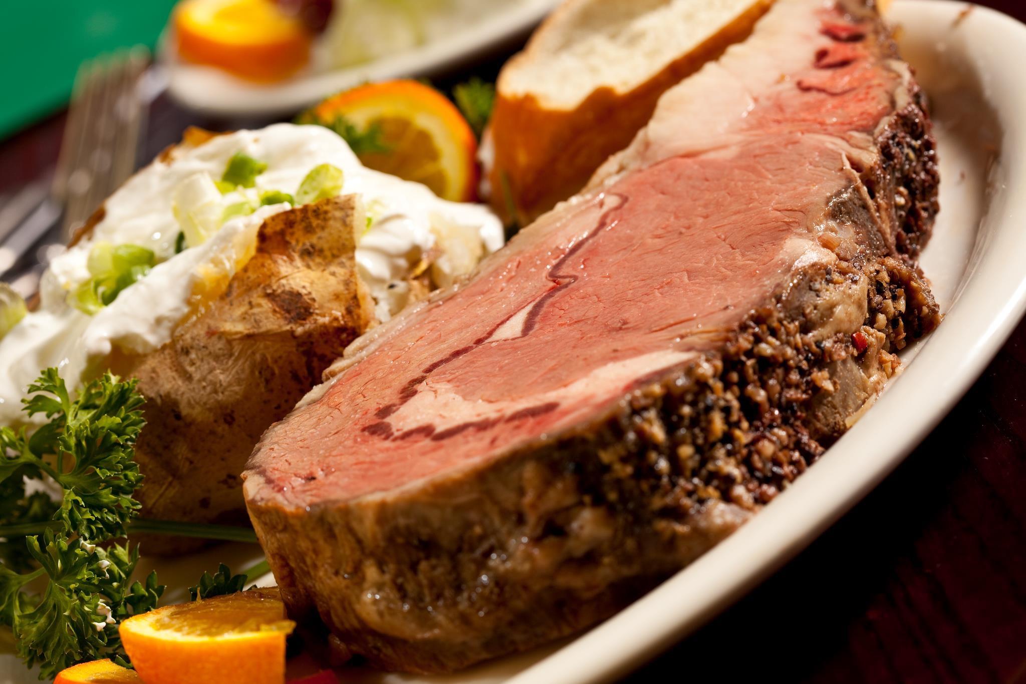 Prime rib with a baked potato